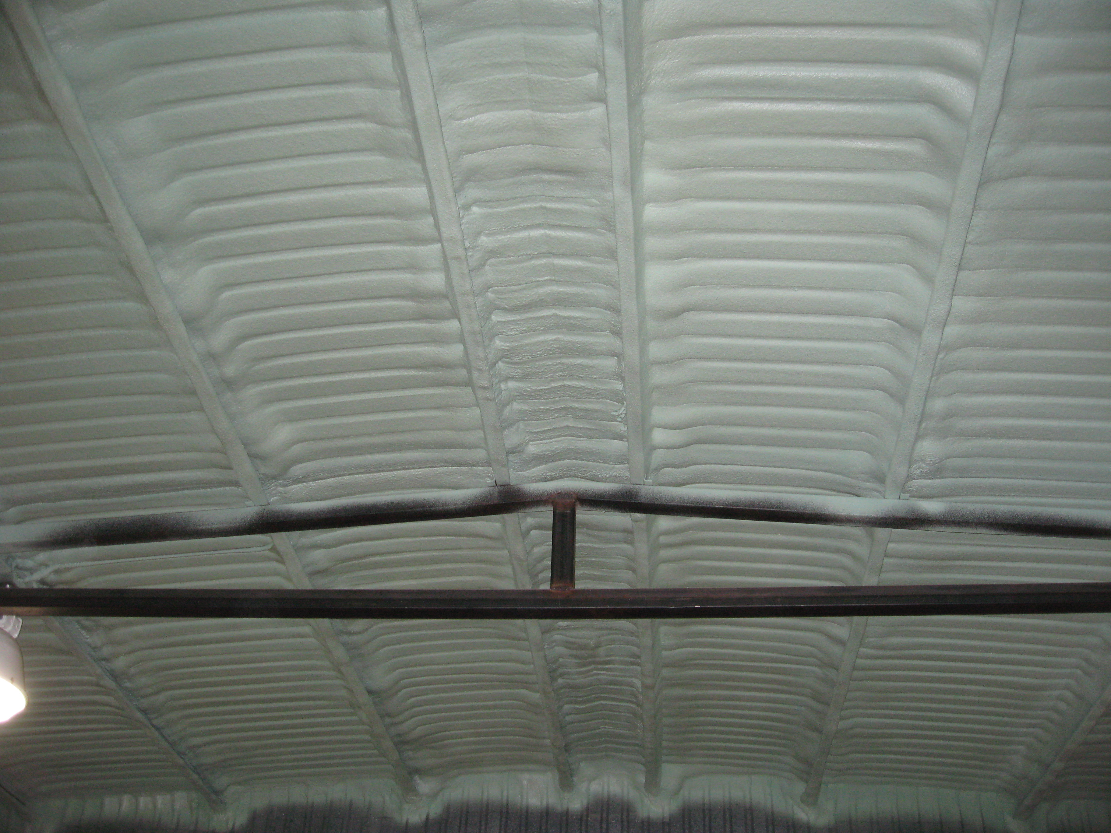 closed cell foam under metal roof